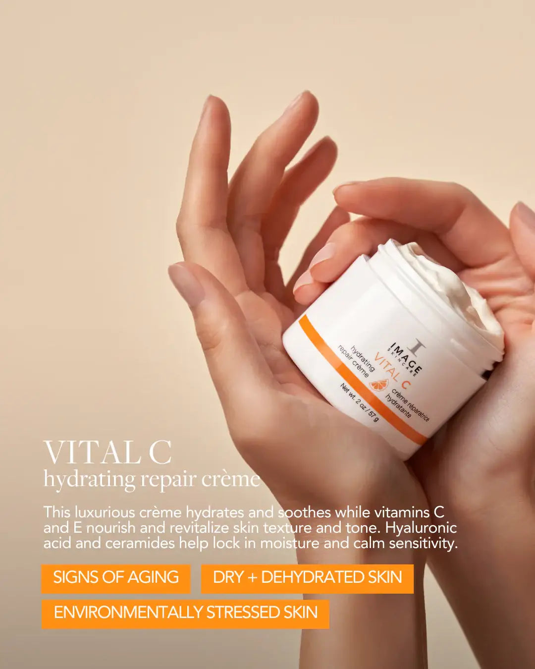 Hands holding Image Skincare Vital C hydrating repair crème jar for dry, aging skin care