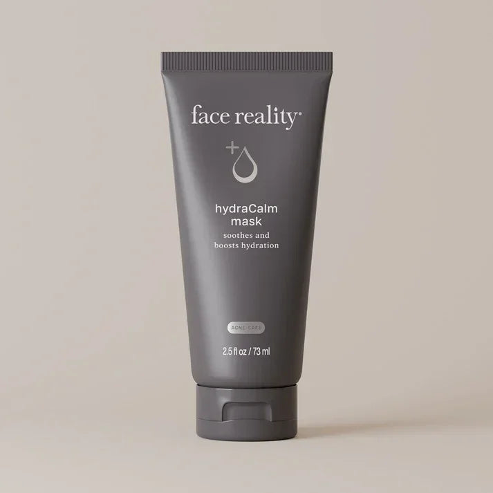 Face Reality hydraCalm mask tube for soothing, hydrating skincare on neutral background