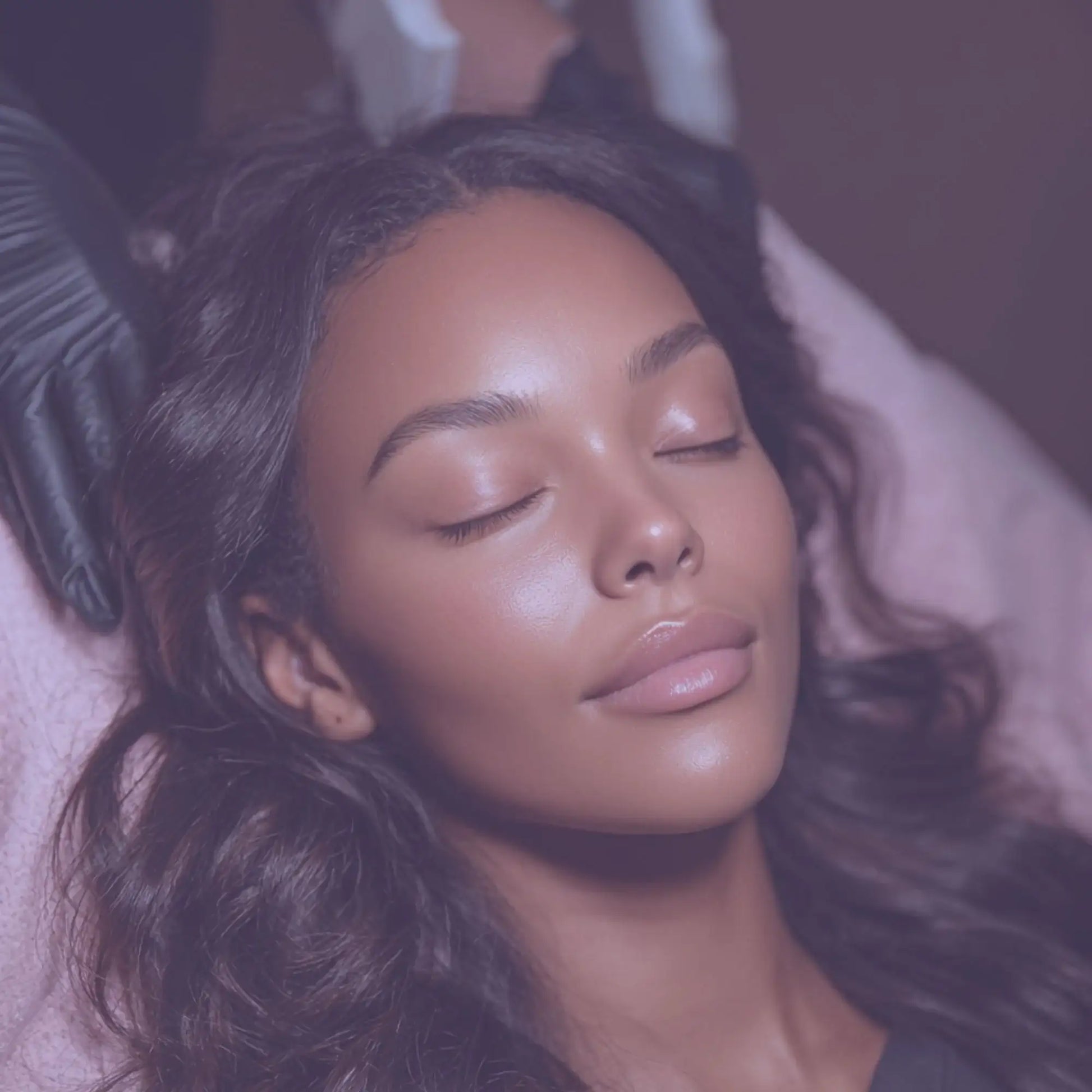 Woman receiving professional skincare facial treatment, smooth glowing skin, relaxing spa