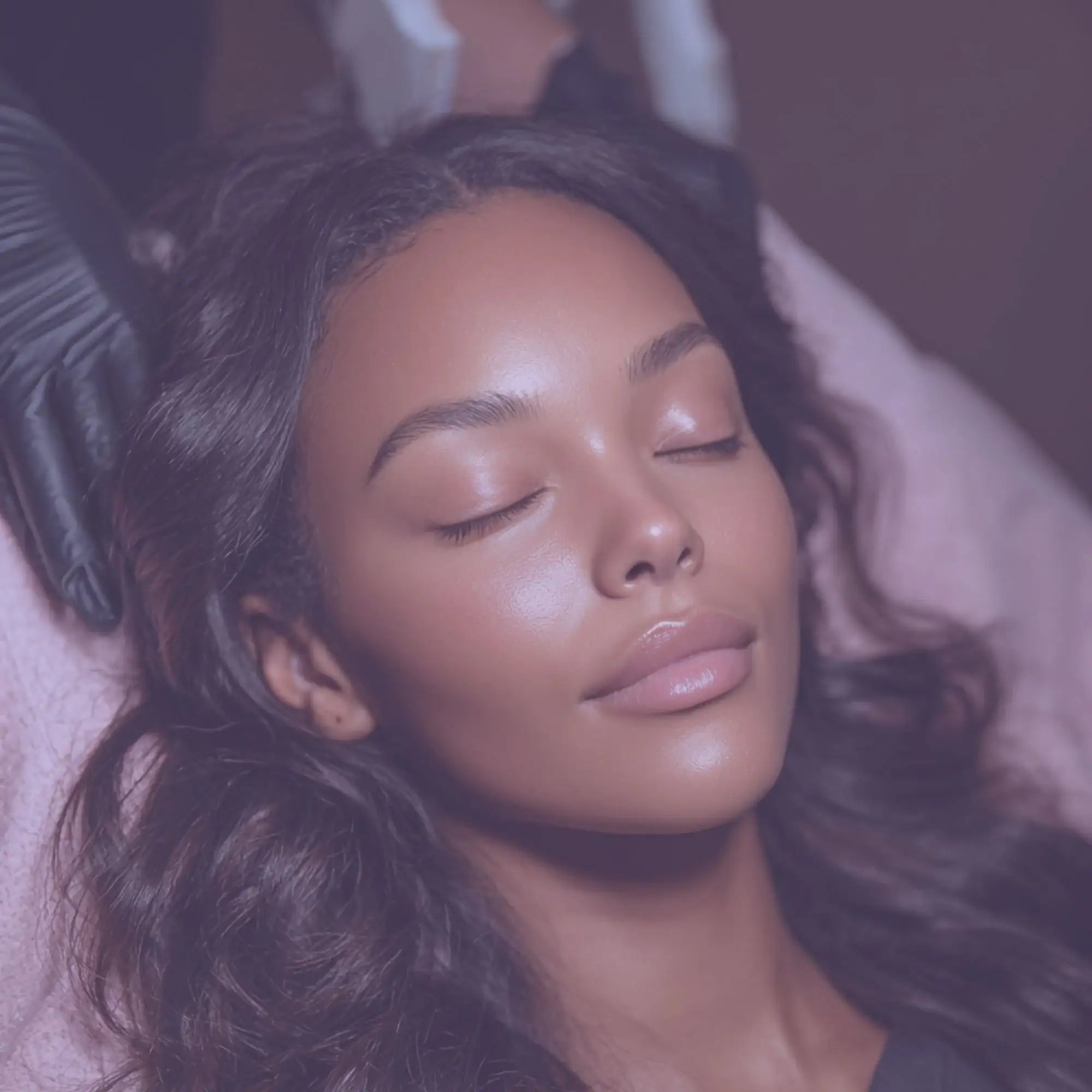 Woman receiving professional skincare facial treatment, smooth glowing skin, relaxing spa