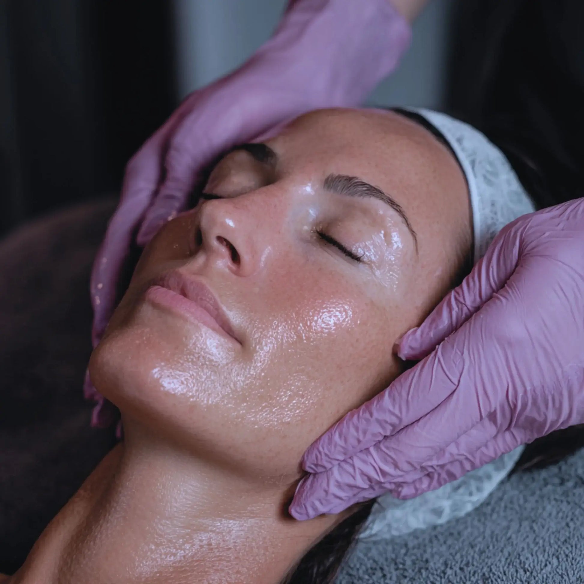 Professional facial massage with hydrating skincare treatment for glowing skin
