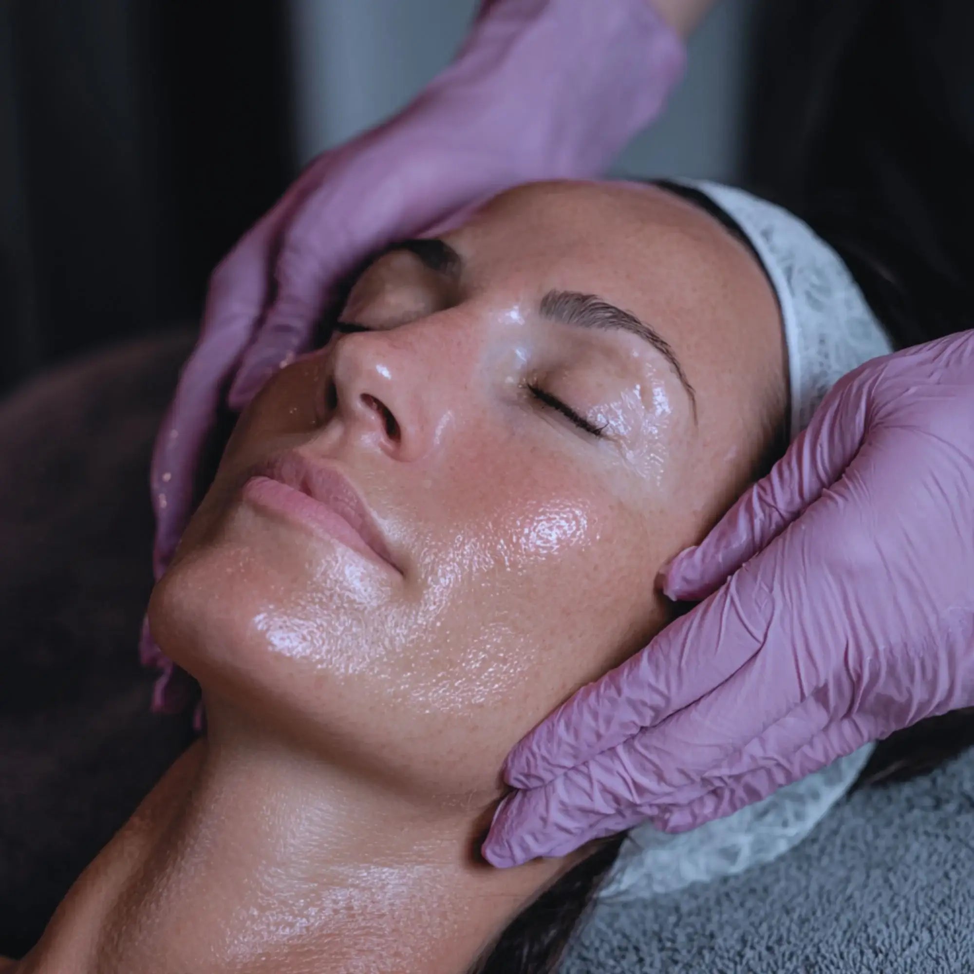 Professional facial massage with hydrating skincare treatment for glowing skin