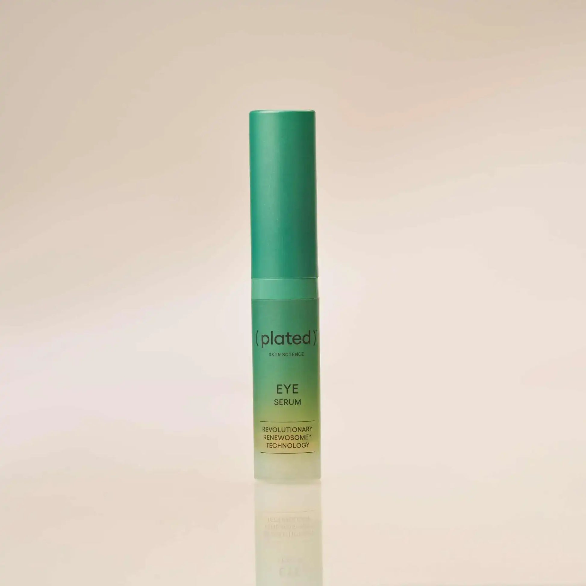 Plated Skin Science Eye Serum with Renewosome Technology, green bottle on neutral background