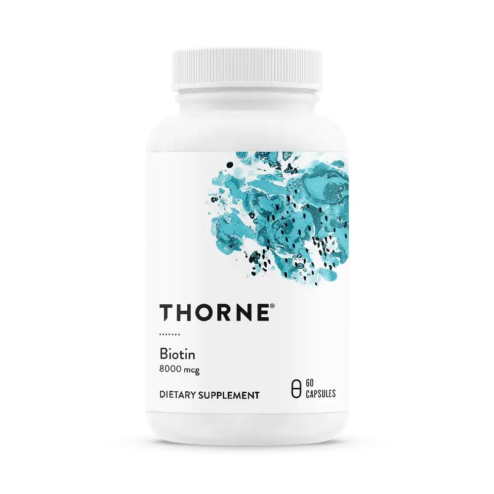 Thorne Biotin 8000 mcg dietary supplement bottle with 60 capsules and blue abstract design